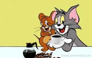 Tom-Taking-A-Cup-Of-Coffee-600x375.jpg