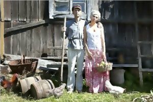 retro-couple-farm-stiff-old-classic-pose-standing-front-wooden-stable-some-hens-grazing-grass-...jpg