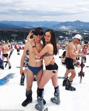 4B3551AF00000578-5620623-Snowboarders_pose_in_their_skimpy_outfits_before_the_descent_beg-a-97...jpg