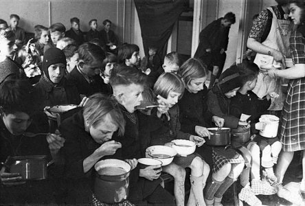 dutch children eating soup during the famine of 1944-45.jpg