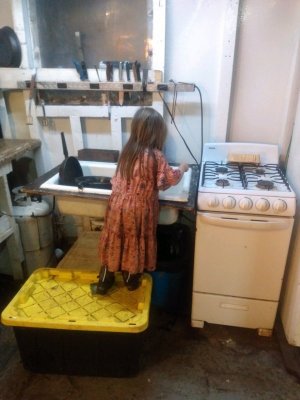 maddy working the galley.jpg