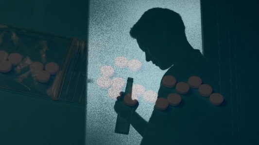 man and bottle.jpg