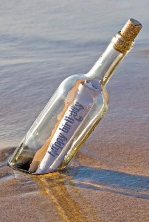 Bottle Birthday Message stock photo_ Image of ocean, paper - 20290796.jpeg