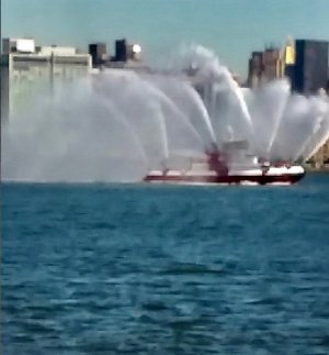 Boat Spraying Water Photo .jpg