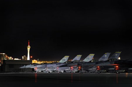 79th-Fighter-Squadron-‘Tigers’-pilots-sit-stacked-on-the-Nellis-AFB-runway.jpg