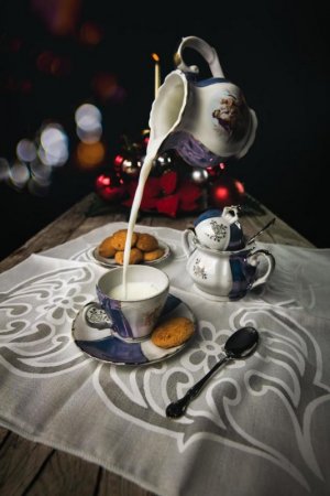 antique-tea-set-with-cookies-and-falling-milk-free-photo.jpg