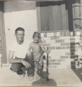 dad and me in front of house.JPG