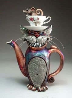 2adaa5e4b39419d1d23d36d71caa24c3--cheshire-cat-art-sculptures.jpg