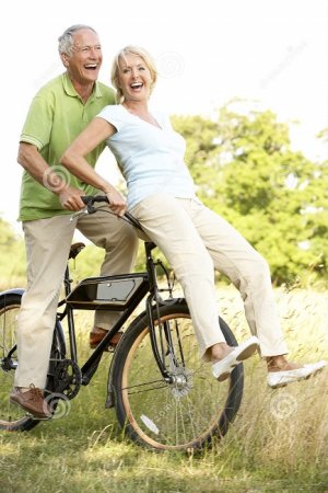 mature-couple-riding-bike.jpg