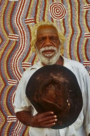 Dinny-Nolan-Jampitjinpa-with-his-painting-Papunya-aboriginal-comunity-NT.jpg