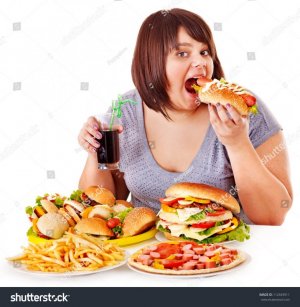 stock-photo-overweight-woman-eating-fast-food-112443911.jpg