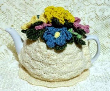 Floral-Melody-Blue-Yellow-Crochet-Teapot-Cover-Cozy-One-of-a-Kind_480x[1].jpg