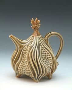 a57c7bb4caeab2c7e9875c8246664e08--pottery-teapots-raku-pottery.jpg