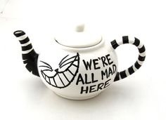 19b0f5d10f6b0d225a94393363f8c721--alice-in-wonderland-teapot-pottery-painting-ideas.jpg