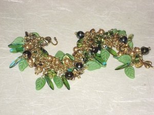 swarovski pearls.glass leaves. goldplate.jpg