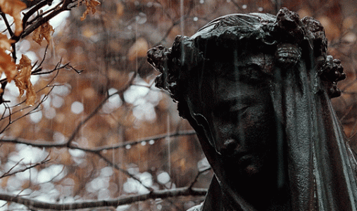 statue in the rain morn.gif