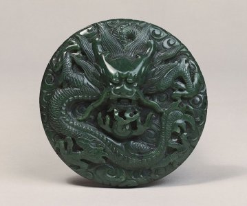 Dragon-clouds-jade-medallion-or-button-Qing.jpg