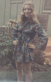 70s braless barefoot headband miniskirt.jpg