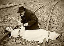 65 Tied Up Women People Railroad Track Stock Photos, Pictures &  Royalty-Free Images - iStock