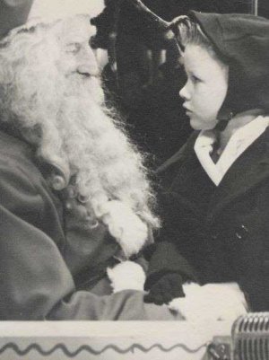 Pecos at Age Four Getting Serious With Santa Small.JPG