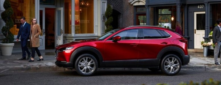 2020-Mazda-CX-30-red-paint-parked-on-side-of-city-street-facing-right_o-1038x400.jpeg
