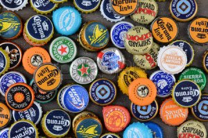 29153233-irvine-ca--june-16-2014-high-angle-shot-of-a-group-of-assorted-beer-bottle-caps-the-cap.jpg