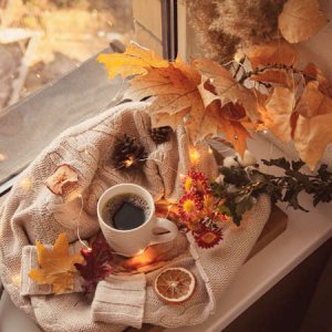 154010424-cozy-autumn-still-life-on-the-windowsill-coffee-mug-surrounded-by-sweaters-and-autum...jpg