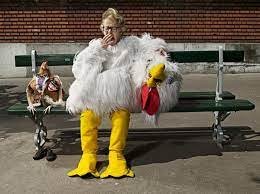 An Elderly Woman and Her Chicken (7 Pics)