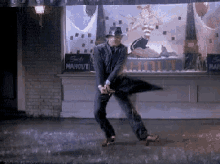 singing-in-the-rain.gif