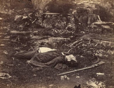 soldier-dead-with-rifle.jpg