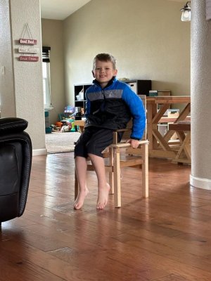 Luke in his chair.jpg