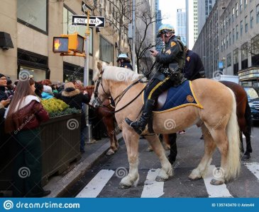 nypd-mounted-unit-duty-ny-police-officers-horses-securing-crowd-rockefeller-center-manhattan-1...jpg