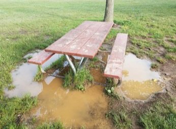 wet-picnic-table-mud-puddles-260nw-639357598.jpg