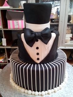 eaa340db9dca8750032a3bfc3efb9f4b--gay-wedding-cakes-tuxedo-cake.jpg