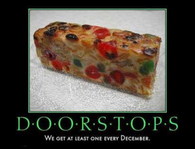doorstops-unwanted-gift-of-fruitcake-demotivational-posters-1338954595.jpg