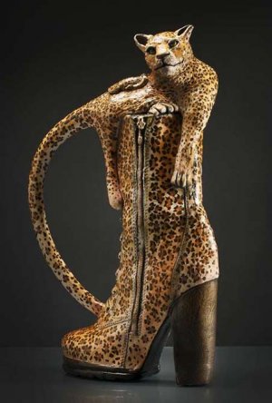 Fit-to-a-Tea-is-a-teapot-in-the-form-of-a-leopard-patterned-boot-surmounted-by-an-emerging-leo...jpg
