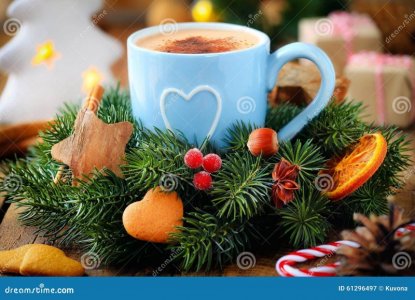 christmas-coffee-good-morning-concept-cup-frothy-decorated-wreath-gifts-candles-background-612...jpg