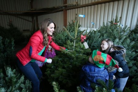 catherine-duchess-of-cambridge-helped-by-children-picks-a-news-photo-1575586462.jpg