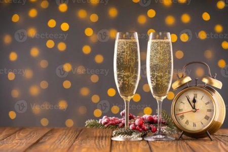 two-wine-glasses-with-bubbly-champagne-on-blurry-sparkling-lights-background-photo.jpg