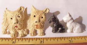plastic scottie brooches.jpg