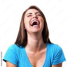 young woman laughing hysterically Stock Photo | Adobe Stock