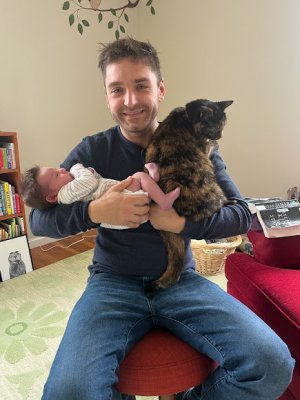 Eric with baby and cat.jpg