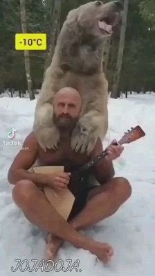 Beautiful man and bear.jpg