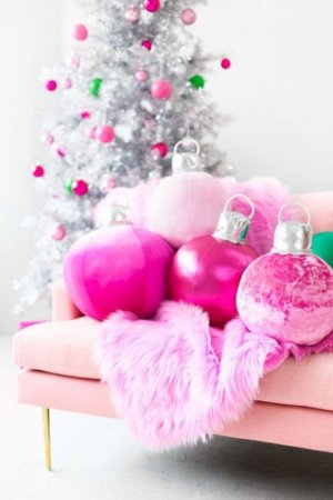 hot-pink-Christmas-ornament-pillows-and-a-faux-fur-blanket-plus-matching-ornaments-on-the-silv...jpg