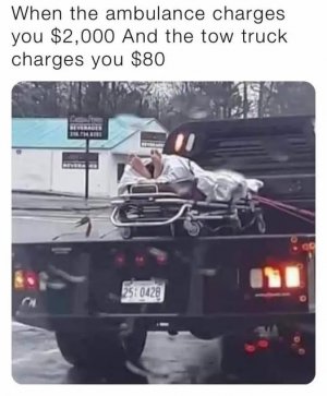 ambulance vs towtruck.jpg