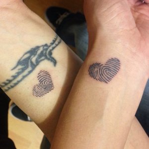 his-and-hers-matching-thumbprint-tattoos.jpg his-and-hers-matching-thumbprint-tattoos.jpg
