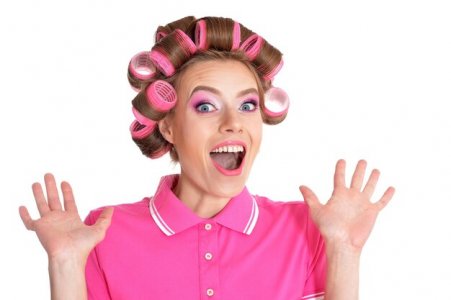 portrait-young-woman-hair-curlers-posing_484921-40143.jpg