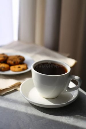 delicious-coffee-cookies-newspaper-table-good-morning-177117816-3742922052.jpg