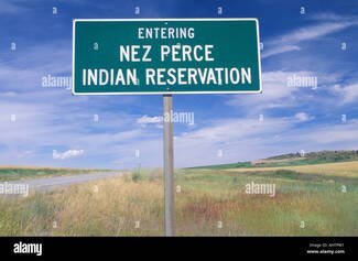 a-sign-that-reads-entering-nez-perce-indian-reservation-AHTPW1-2044066929.jpg