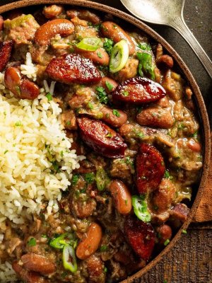 A-bowl-of-red-beans-and-rice-topped-with-andouille-sausage-and-green-onions~2.jpg